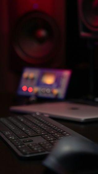 black remote control beside black computer keyboard
