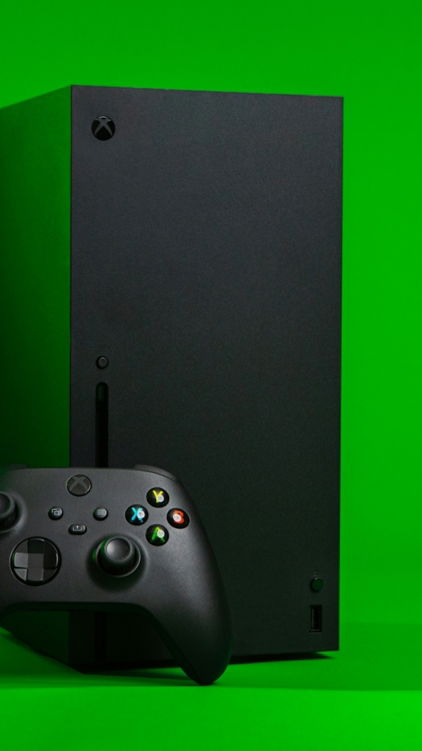 black xbox one console with controller