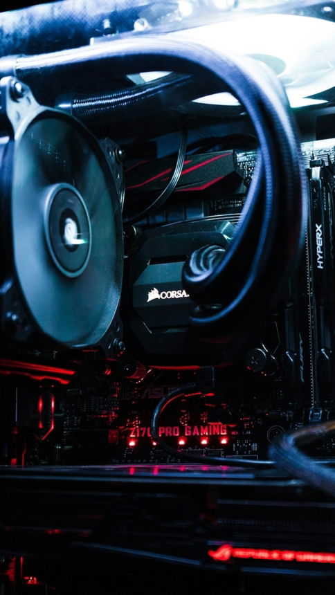 turned-on black and red computer tower